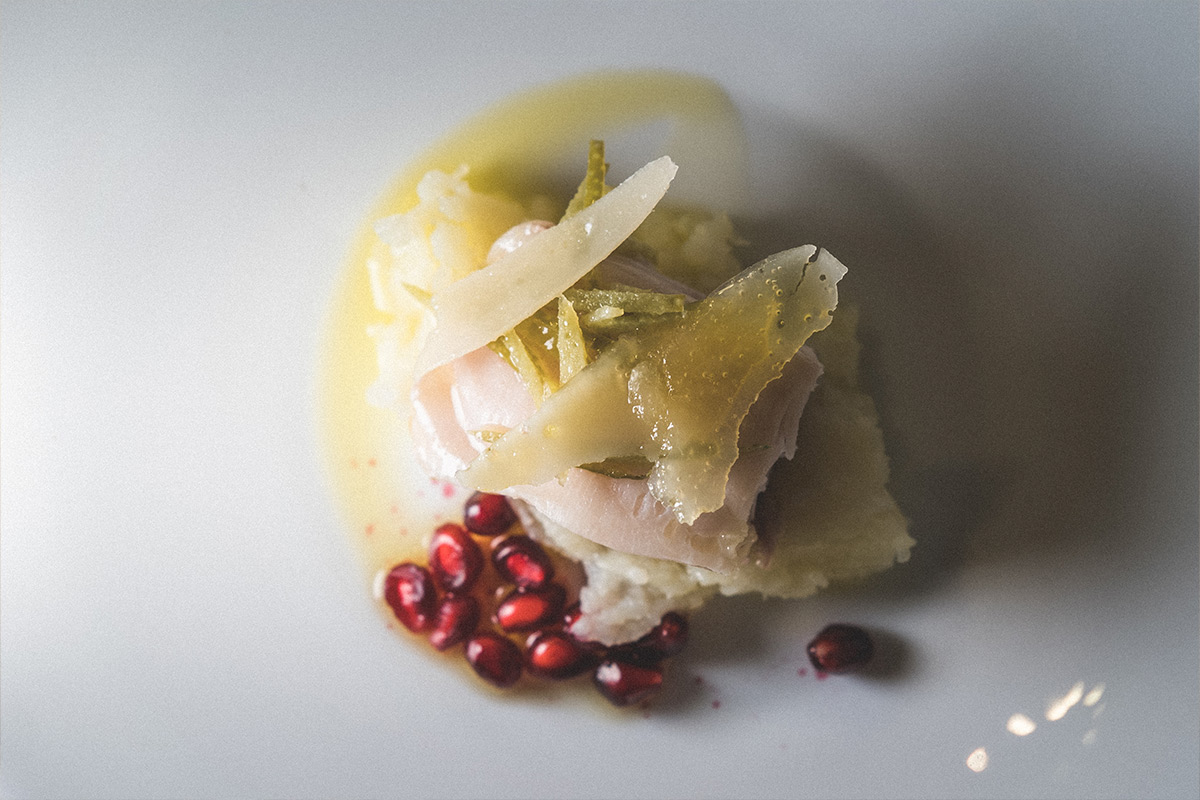 Storione in bianco con olio del Garda, cedro di Gargnano e Grana Padano Dop 12 mesi Osteria da Pietro, abbinamenti tra Grana Padano Dop e vini lombardi