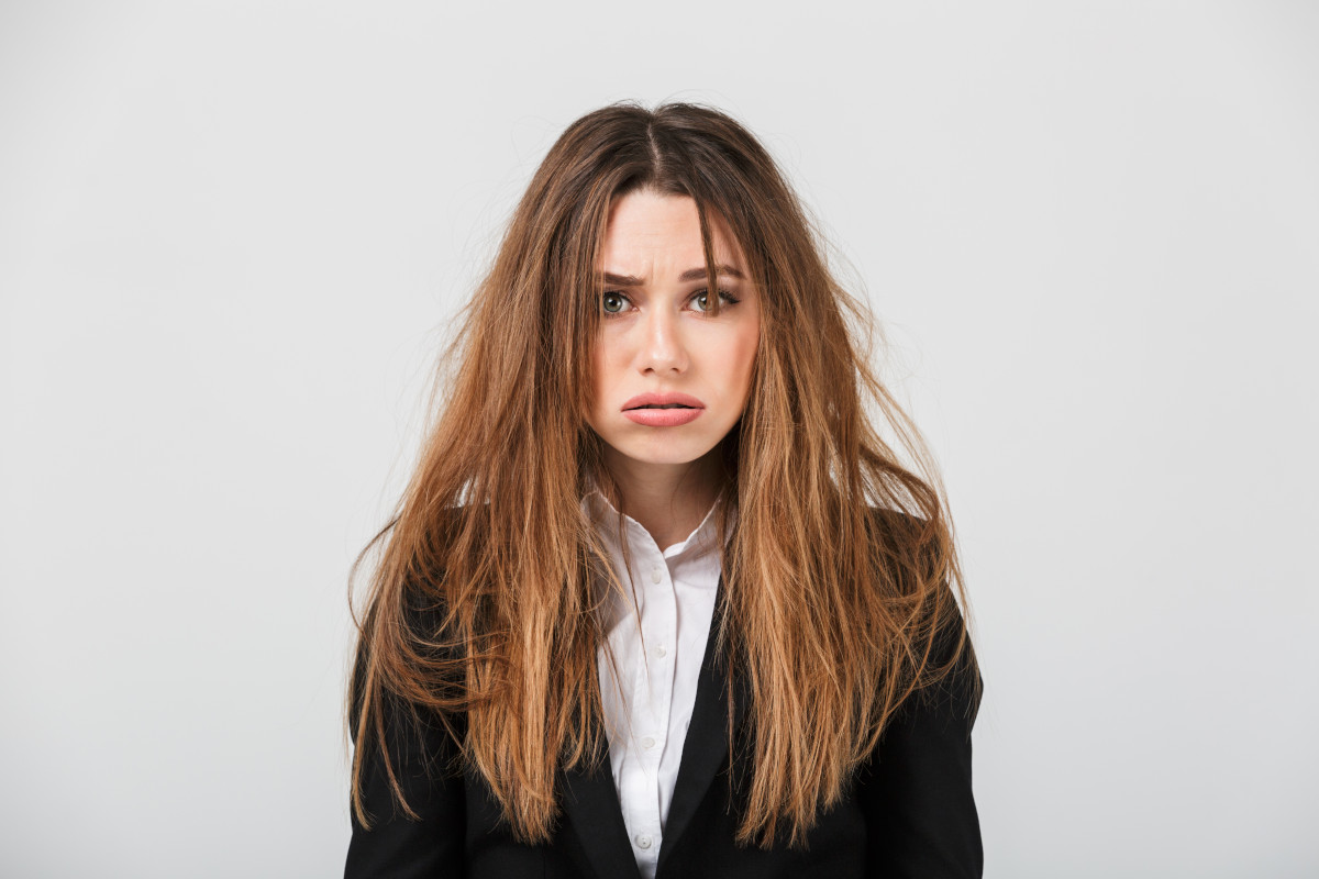 Come proteggere i capelli dai danni del sole e dallo smog?