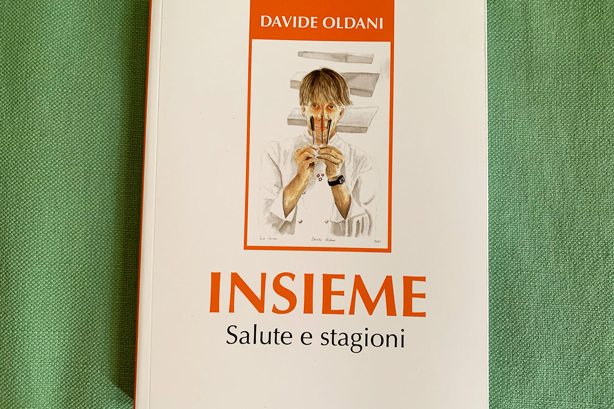 La copertina di Insieme - Salute e stagioni Davide Oldani: sessanta ricette per la lotta al cancro