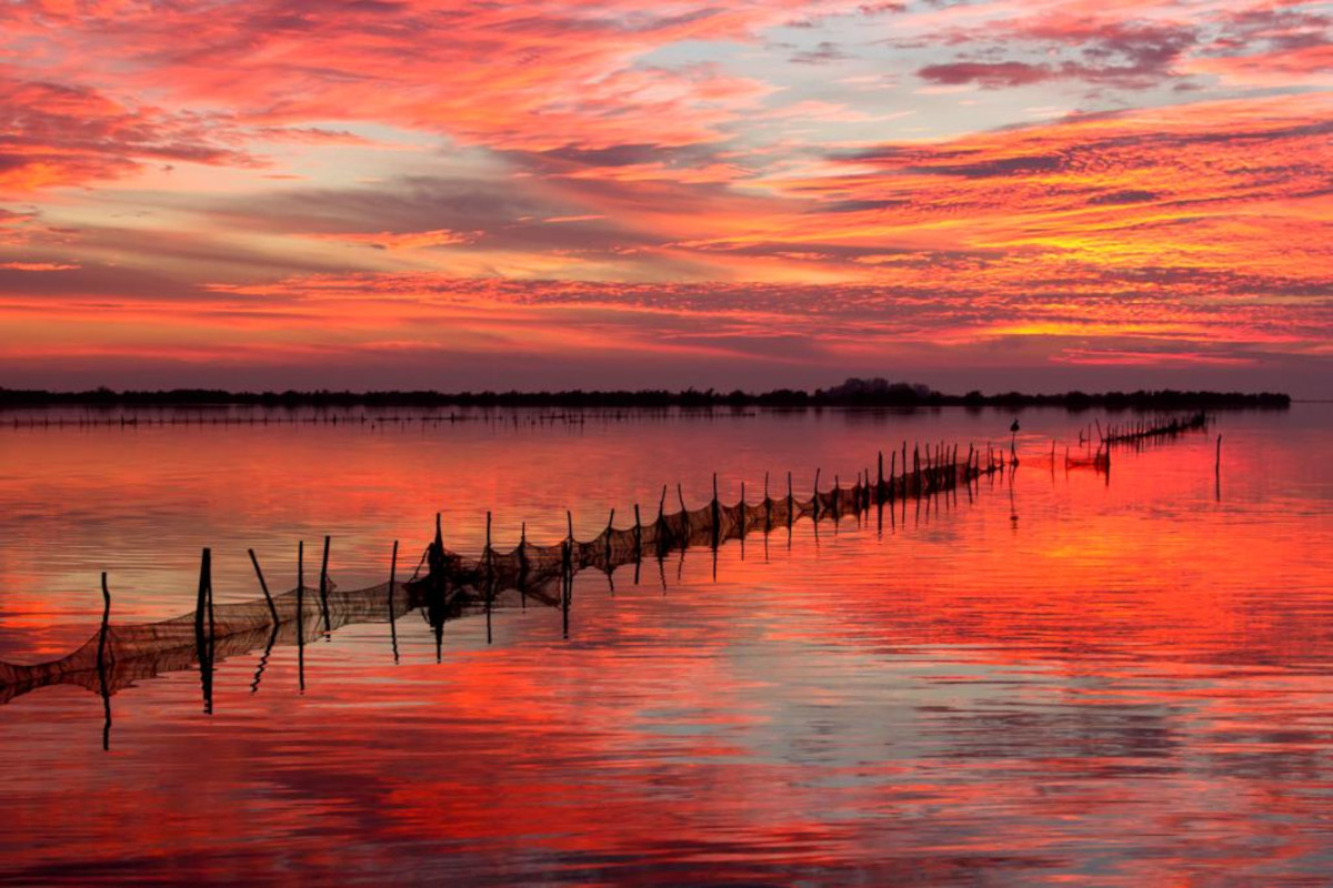 Tramonto in laguna tra Grado e Aquileia  Da Aquileia a Grado una vacanza per famiglie in Friuli