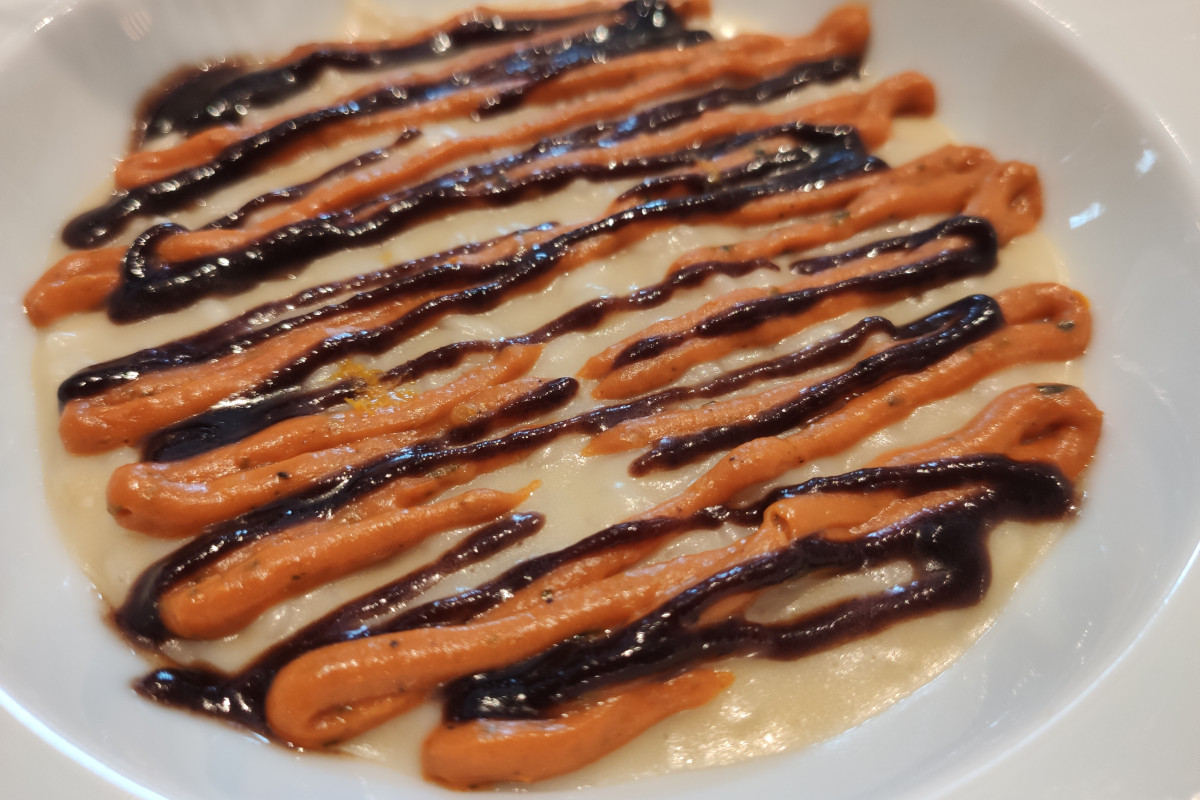 Risotto al finocchio, pomodoro confit, oliva nera e arancio Gli Amaroni di Falezze incontrano la cucina di Gianfranco Perbellini